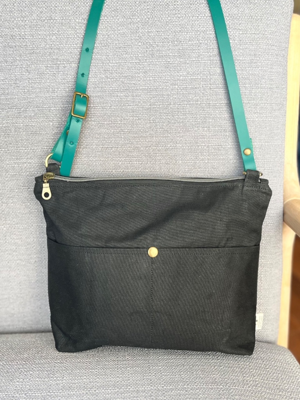 Handmade crossbody bag: black waxed canvas teal leather